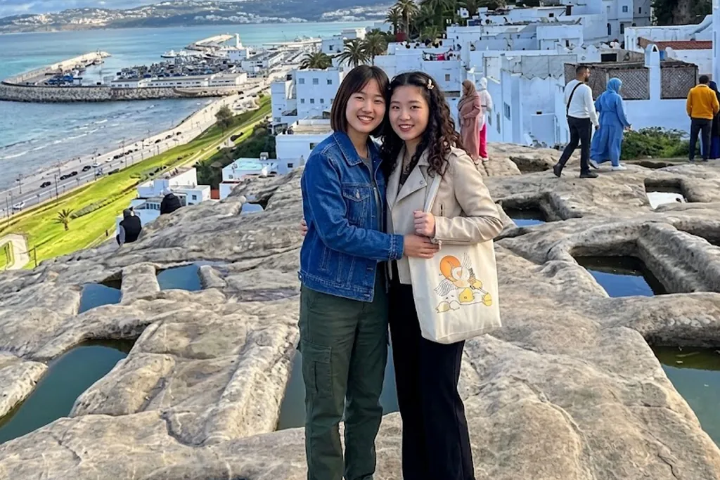 Travelers enjoying a private tour of the Tangier coastline and old medina views